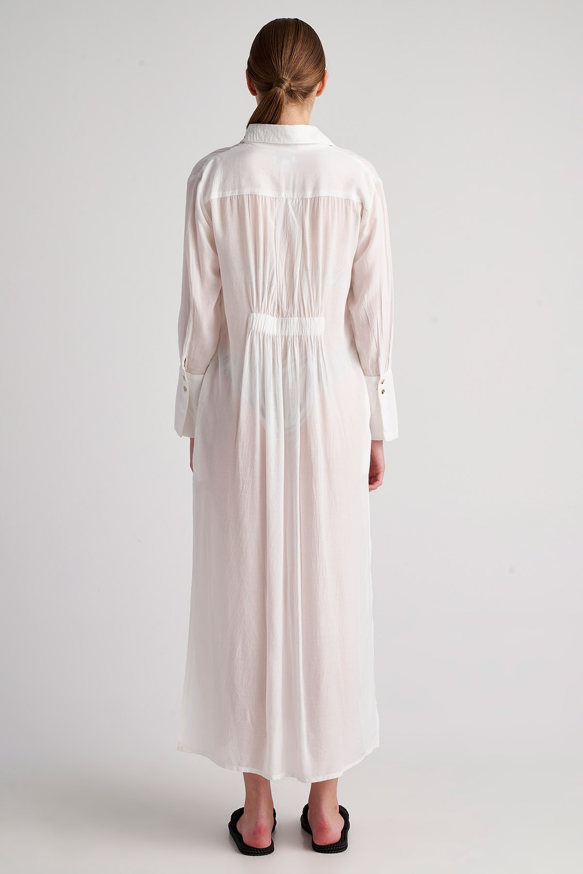 ΜΑΚΡΥΜΑΝΙΚΟ ΦΟΡΕΜΑ/ΠΟΥΚΑΜΙΣΑ ΜΕ ΚΟΥΜΠΙΑ φωτογραφία