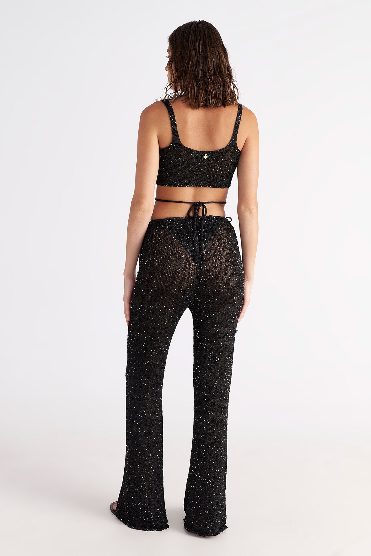 FLARED ΗΜΙΔΙΑΦΑΝΟ LUREX ΠΛΕΚΤΟ ΠΑΝΤΕΛΟΝI φωτογραφία