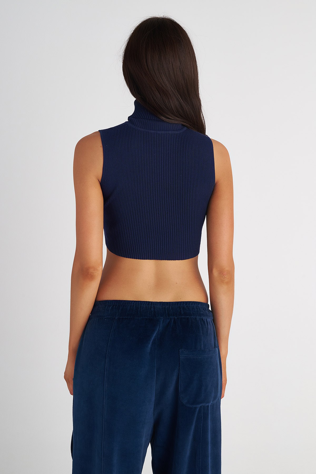 ΠΛΕΚΤΗ ΑΜΑΝΙΚΗ ΜΠΛΟΥΖΑ ΜΕ ΖΙΒΑΓΚΟ φωτογραφία