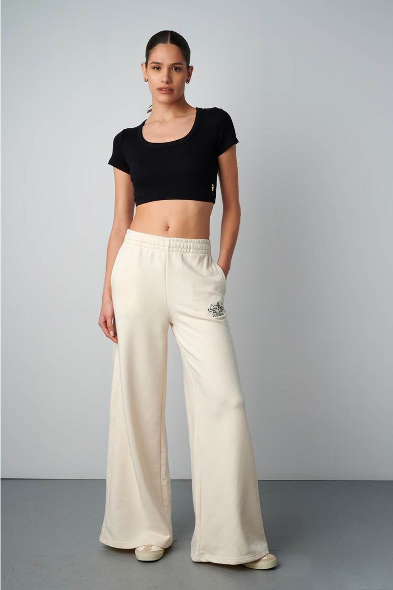 HIGH WAISTED FLARED COTTON PANTS WITH BLACK EMBROIDERED DETAIL-25811023-103