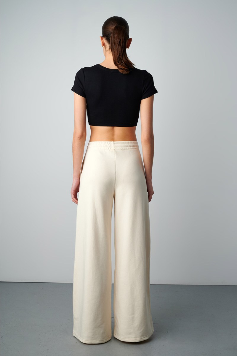 HIGH WAISTED FLARED COTTON PANTS WITH BLACK EMBROIDERED DETAIL-25811023-103
